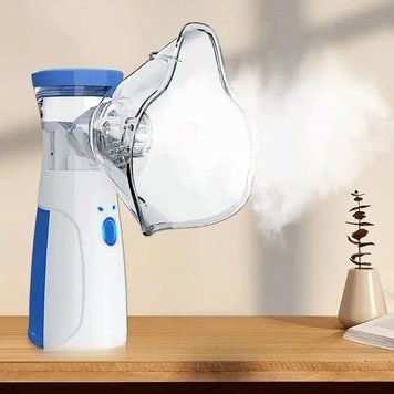 Портативный небулайзер Mesh Nebulizer JSL-W302 ∙ Ультразвуковой ручной ингалятор + 2 маски для домашнего использования 55104/5 фото