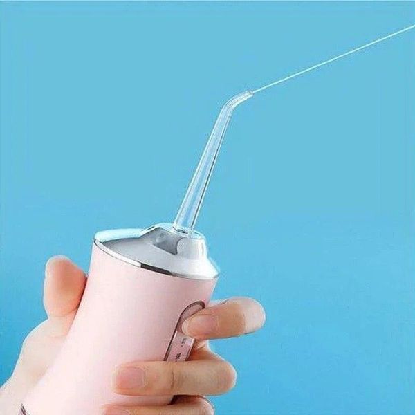 Портативний іригатор для ротової порожнини ORAL IRRIGATOR з насадками ∙ Електричний іригатор &ndash; флосер для зубів ∙ USB зарядка 51447/10 фото
